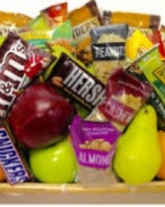 fruits,coffee,chocolate & snack in a basket